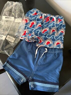Hanna Andersson Blue Shark Wave and blue Colorblock swim trunks Kids Swim Trunks